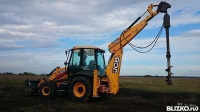 Бурение под фундамент ямобуром JCB 3CX 200мм